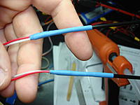Name: DSC01432.jpg
Views: 52
Size: 118.8 KB
Description: Introduced top side of Scherrer antennas inside a DuBro tubing and heat shrink for a stable fixing.