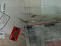 Name: IMG_0205.jpg
Views: 44
Size: 152.9 KB
Description: Holes on top of box. Thankfully there was a layer of air filled plastic "pillows" which prevent the wings from being damaged
