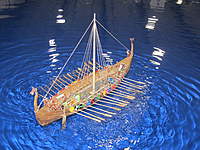 Name: IMG_3891.jpg
Views: 31
Size: 119.2 KB
Description: This was a really cool Viking ship where the oars actually worked