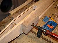 Name: Picture or Video 036.jpg
Views: 218
Size: 73.0 KB
Description: Pulling the nose together bows the sides out so I squeezed them gently back and added the lower ply sheet.