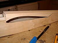 Name: Picture or Video 037.jpg
Views: 284
Size: 52.1 KB
Description: Adding the pre-cut upper wing fairing seats with 1/4 triangle stock on the inside. The gap at the back gets filled with ply once it's cut away after shaping.