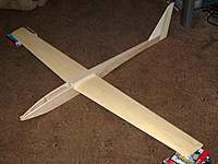 Name: Picture or Video 039.jpg
Views: 326
Size: 89.2 KB
Description: Test fit of the wings, I had to break and re-spot glue the front of the upper sheet as they would not go in at first.
