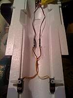 Name: servo instalation.jpg
Views: 87
Size: 119.2 KB
Description: I widened the grove where the wires route through to allow for the servo connectors to sit in. Note swept cheater holes