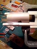 Name: rear fuse attached.jpg
Views: 81
Size: 50.1 KB
Description: rear fuse to be epoxied down, clamping thrust tube in.
The middle section will be held on using magnets to allow fan access