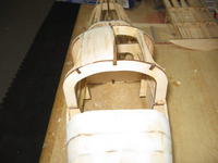 Name: 29c.jpg
Views: 160
Size: 52.1 KB
Description: Started Balsa sheeting the top of the canopy.