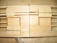 Name: 38a.jpg
Views: 171
Size: 68.9 KB
Description: The wing before the mounts were installed.  I don't have any pictures of the brackets that were glued to the side of the ribs.