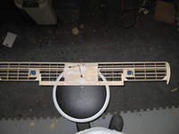 Name: 38e.jpg
Views: 154
Size: 56.2 KB
Description: The wing with the servo's glued to their hatches. The holes are cut out for the aileron extension cables.