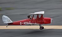 Name: 035A4534-1.jpg
Views: 24
Size: 66.3 KB
Description: Tims red and silver Tigermoth, with Barbie in the drivers seat just after liftoff