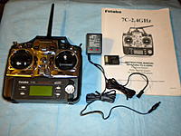 Name: DSCN5671.jpg
Views: 68
Size: 215.3 KB
Description: Futaba 7C 2.4GHz Radio System with the R617FS FASST 7-Channel Receiver, Charger and Manual.

--------------------------------------------------------------------------------