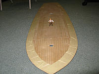 Name: tm29b.jpg
Views: 62
Size: 176.8 KB
Description: Shipwright Marty examines the deck progress... or is he searching for the ultimate wave?