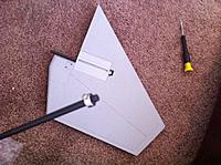 Name: su35 bphoto 5.jpg
Views: 262
Size: 188.6 KB
Description: Carbon rod slides into elevator and is secured with a collar thus along the rudder to swivel on the rod.