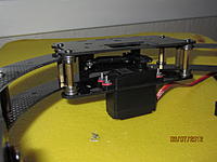 Name: IMG_0480.jpg
Views: 342
Size: 155.8 KB
Description: Roll axis is directtly conncted via simple servoarm. Simple and effective. Servos are thight and have very little backlash, looking forward to trying this gimbal out.