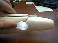 Name: IMG00185-20110201-1131.jpg
Views: 667
Size: 85.0 KB
Description: The instructions tell you to cut the tail just above the elevator opening to slip the elevator. Later, epoxy it.