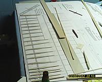 Name: EKEN0011.jpg
Views: 70
Size: 152.3 KB
Description: Ribs for wing all sanded down, fitted for spars and sorted out.