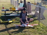 Name: DSC00975.jpg
Views: 192
Size: 215.2 KB
Description: Dave getting the T-34 ready. Yellow Sky Cat in the background.