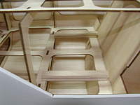 Name: 038.jpg
Views: 387
Size: 47.8 KB
Description: Battery tray supports ready to be epoxied underneath.