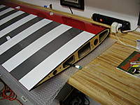 Name: 068.jpg
Views: 463
Size: 90.3 KB
Description: Root of wing showing multiplex connector and 1/32" thick black foam strip around root 
(McMaster Carr)