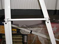 Name: 010.jpg
Views: 485
Size: 56.0 KB
Description: Close up of the cross member showing how the rear "T" block is angled towards the strut plane by the strap