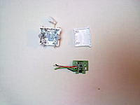 Name: 021220111223.jpg
Views: 52
Size: 142.6 KB
Description: wii motion plus, taken apart and wires soldered to correct points.....