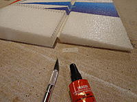 Name: DSC00042.jpg
Views: 213
Size: 267.0 KB
Description: Step 03 - same as Step 02, except on the inboard side. Note - what you are doing is providing re-enforcement to the hinge area so that it will not tear or seperate over time.