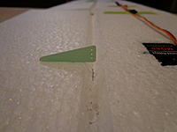 Name: DSC00158.jpg
Views: 184
Size: 98.5 KB
Description: Step 07g - Cut a slit for the horn. Note the location of the holes in the horn. A small mark with a thin sharpe in the bottom of the hinge "vee"  will help alignment