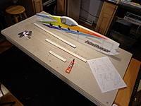 Name: DSC00078.jpg
Views: 168
Size: 192.3 KB
Description: Step 09b - Lay down a bead of Welders on both mating surfaces. Use some old business cards cut up to spread thin and smooth. Let tack up for 10 min or so.