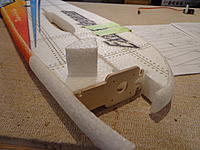 Name: DSC00142.jpg
Views: 167
Size: 211.7 KB
Description: Step 13e - Locate the top nose piece. It will match up with the curve of the fuselage better one way than the other. Make note of this and coat the appropriate surfaces with Welders and let tack up.