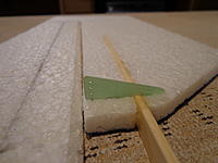 Name: DSC00123.jpg
Views: 158
Size: 130.1 KB
Description: Step 21d - Cut a slot, rough up the tab that goes into the foam, wipe clean, insert some Welders and assemble. Let dry.