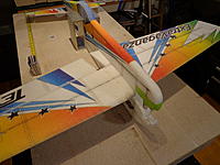 Name: DSC00197.jpg
Views: 170
Size: 229.0 KB
Description: Step 27a -  Spread the fuselage and insert the wing. Make sure that the two halves of the fuselage will meet together. You may need to trim a little of the trailing edges were the ailerons were cut to get a nice fit.
