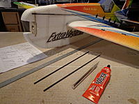Name: DSC00211.jpg
Views: 161
Size: 255.4 KB
Description: Step 28a - Locate the two lower carbon rods for the lower fuselage. Lightly sand and wipe clean.