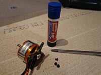 Name: DSC00227.jpg
Views: 142
Size: 251.2 KB
Description: Step 30a - Attach the "X" mount to the motor, use thread locker. Also if needed counter sink the holes deeper if the screw heads are not flush or below.