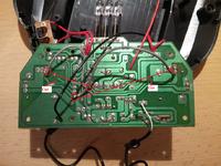 Name: 20121027_190702.jpg
Views: 37
Size: 98.4 KB
Description: Solder two wires (gray in this picture) to the locations shown. Then cut the trace (light green parts on board) in the two locations shown. After this put it back together and you now have a mode 2 controller :)