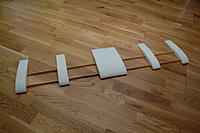 Name: DSC_5048.jpg
Views: 77
Size: 193.6 KB
Description: My Clarke Y wing. Two wooden spars, 2mm x 10mm x 1000mm, attached verticaly. The ribs are cut out of 5cm EPS.