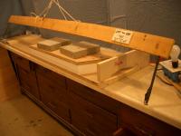 Name: flying wings 031.jpg
Views: 104
Size: 70.1 KB
Description: This is the set up ready to cut.  Notice the jig is not touching the foam.  The foam is aligned now with a pattern drawn on the board which is a change.  The TE is set up on the edge of the board.