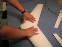 Name: 006.jpg
Views: 2196
Size: 47.1 KB
Description: The foam insulates the glue so it takes longer to cool.  Hold in place until cool.