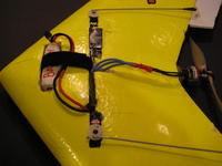 Name: RC4 6-09 043.jpg
Views: 1733
Size: 57.3 KB
Description: The Velcro stuck together securing battery and wires.  Notice how the battery wire is also under the Velcro.