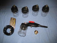 Name: 004.jpg
Views: 1450
Size: 83.8 KB
Description: This is the budget airbrush with 5 spray bottles.  This is like spraying with a spray can.  It is either on or off.  It works better with a pressure regulator on the compressor.