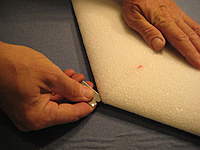 Name: IMG_3651.jpg
Views: 460
Size: 58.6 KB
Description: 3. Cut a 1/4" deep slit around the entire perimeter of the wing with a razor blade.  Use your fingers for a depth gauge.