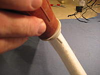 Name: IMG_3659.jpg
Views: 462
Size: 51.2 KB
Description: 3. Make sure the trailing edge is straight before gluing it in place.  I use a basting bulb with baking powder in it to get baking soda around the shock cord in the slit.