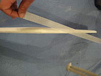 Name: IMG_3667.jpg
Views: 458
Size: 57.9 KB
Description: 4. Apply the bidirectional tape to the leading edge, trailing edge and around the battery slot.