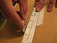 Name: IMG_3671.jpg
Views: 441
Size: 62.3 KB
Description: 5.  To cut the bevel use a straight edge and a very sharp (new) razor blade and cut the angle.