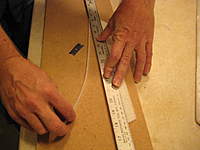 Name: IMG_3673.jpg
Views: 430
Size: 67.2 KB
Description: 5. This is the piece of foam I cut out of the elevon to angle the hinge line.