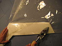 Name: IMG_3674.jpg
Views: 496
Size: 66.4 KB
Description: 8. I usually cut the laminate in smaller pieces but the laminate is clear and this made it show up better for the pictures.  Put a double layer of laminate on the elevons to make them stiff.