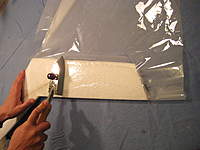 Name: IMG_3675.jpg
Views: 523
Size: 65.9 KB
Description: 8.  The laminate can take more heat than the EPP foam.  Set your iron so it won't melt the foam. Wrap the leading edge from both the top and the bottom so there is a double layer of laminate on the leading edge.