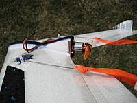 Name: IMG_3783.jpg
Views: 676
Size: 58.7 KB
Description: A little more perspective.  Note the business card fin.  Notice the linkage connections on the servo.  The light ply goes below the mount foam and behind the TE of the wing.