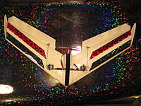 Name: IMG_3789.jpg
Views: 518
Size: 125.6 KB
Description: Top of plane without battery.  I will put holographic tape over the servos to hide them too after I have a few pictures to show the set up.  The main Velcro is white and the Velcro strip is black.