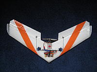Name: IMG_0395.jpg
Views: 334
Size: 249.0 KB
Description: Battery is cut into the wing.  We now recommend the MG30 servos.