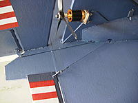 Name: RIMG0009.jpg
Views: 145
Size: 242.0 KB
Description: Rudder and elevon linkage. Ply motor mount and vertical doubler. Prop slot trailing edge dowel attached with GG and wrapped with packing tape.