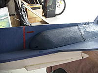 Name: RIMG0010.jpg
Views: 134
Size: 229.2 KB
Description: Front fuselage battery cover. Fuselage shaped from wine bottle shipping foam and glued to R-Tech fuselage profile.