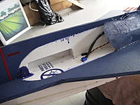 Name: RIMG0011.jpg
Views: 155
Size: 217.5 KB
Description: Battery area exposed; cover removed. Note plugs; battery to ESC and receiver to ESC.  ESC in use on the YF-22 at the moment. Unpainted R-TECH foam.